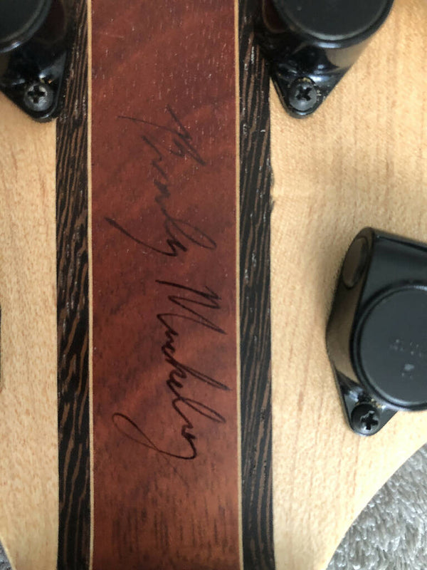 Brady Muckelroy Ensemble Fretless 6 string singlecut